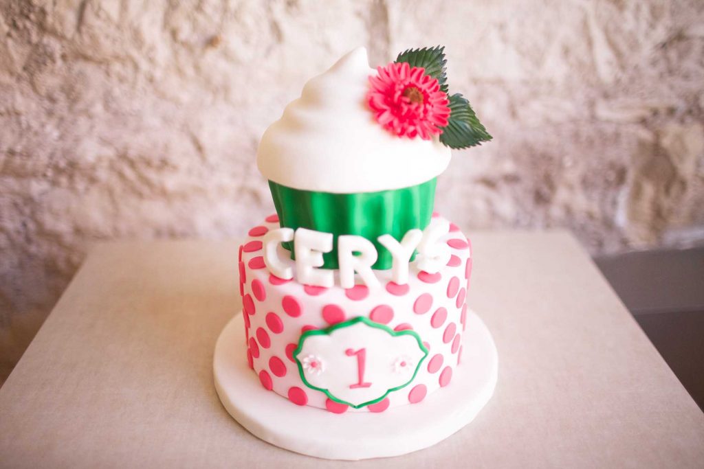 first birthday cake with giant fondant cupcake